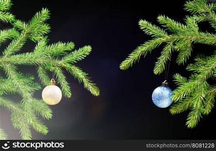 Christmas tree ornaments on dark background