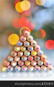 christmas tree pencils and bokeh lights