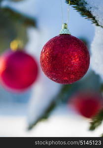 christmas tree red ball decoration with real snow