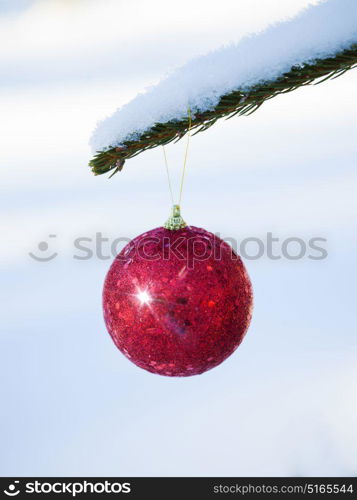 christmas tree red ball decoration with real snow