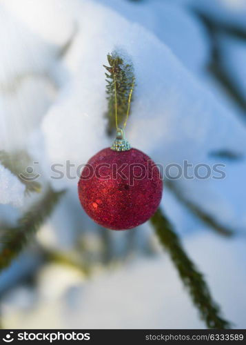 christmas tree red ball decoration with real snow