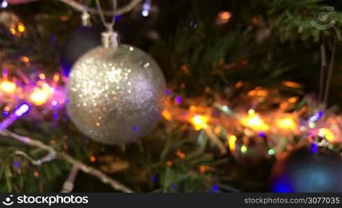 Christmas tree with Christmas balls and colorful lights