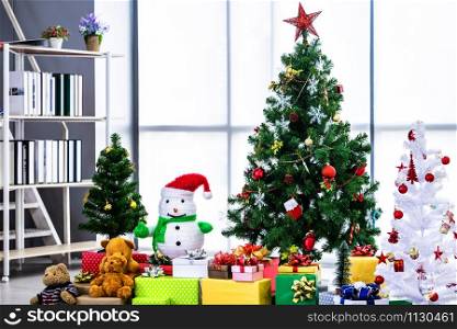 Christmas tree with red gifts in the white room background Decoration During Christmas and New Year.