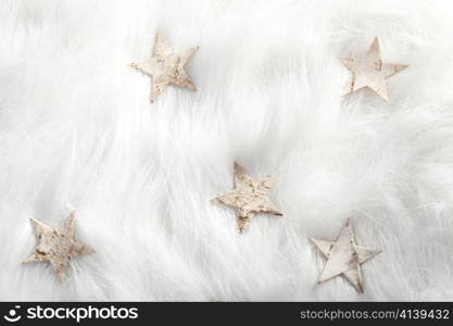 christmas white stars on fur snow background
