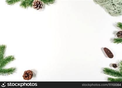Christmas winter composition. Christmas pine cones, fir branches on white background. Flat lay, top view, copy space