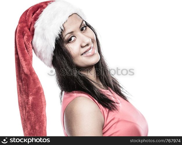 Christmas winter happiness concept. Young woman girl mixed race wearing santa helper hat portrait. White background