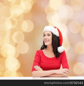 christmas, winter, holidays, happiness and people concept - smiling woman in santa helper hat over beige lights background