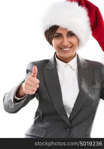 Christmas woman showing thumbs up. Young smiling woman with red santa hat. Image of beautiful young Caucasian model isolated on perfect white background.