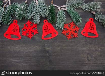 Christmas wooden background with Christmas tree and red decorations. Christmas Wreath with Rustic Wood Background.