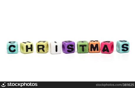 christmas - word made from multicolored child toy cubes with letters