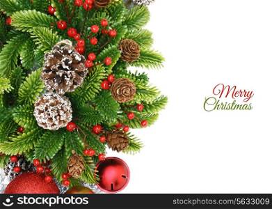 Christmas wreath background with berries, bells and pine cones