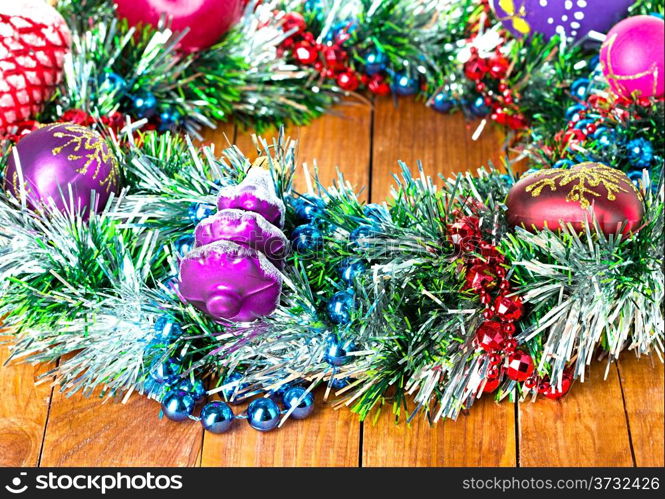 Christmas wreath, ornament on a wooden background