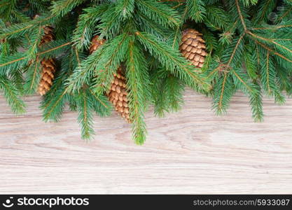 christmas wreath with lights. christmas evergreen tree branches with pine cones