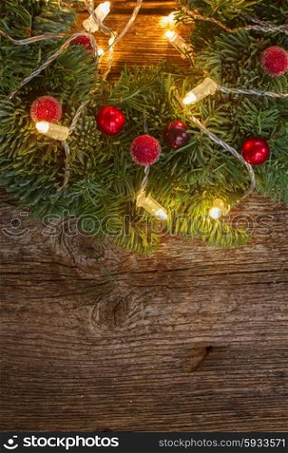 christmas wreath with lights on wooden table . christmas wreath with lights
