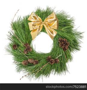 Christmas wreath with pine cones and golden ribbon bow isolated on white background