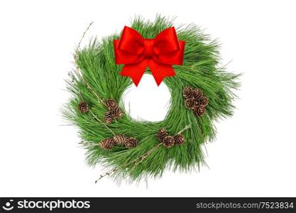 Christmas wreath with pine cones and red ribbon bow isolated on white background