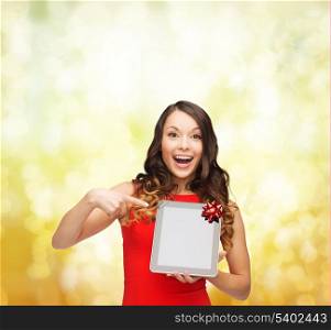 christmas, x-mas, electronics, gadget concept - smiling woman in red dress with blank screen tablet pc