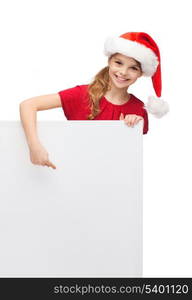 christmas, x-mas, people, advertisement, sale concept - happy girl child in santa helper hat with blank white board