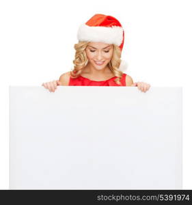 christmas, x-mas, people, advertisement, sale concept - happy woman in santa helper hat with blank white board