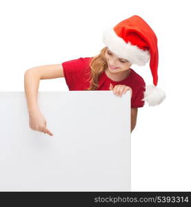 christmas, x-mas, people, advertisement, sale concept - happy woman in santa helper hat with blank white board