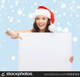 christmas, x-mas, people, advertisement, sale concept - happy woman in santa helper hat with blank white board