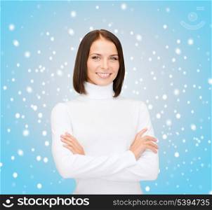 christmas, x-mas, people, happiness concept - smiling woman in white sweater