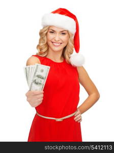 christmas, x-mas, sale, banking concept - smiling woman in santa helper hat with us dollar money