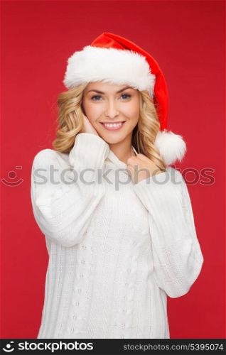 christmas, x-mas, winter, happiness concept - smiling woman in santa helper hat