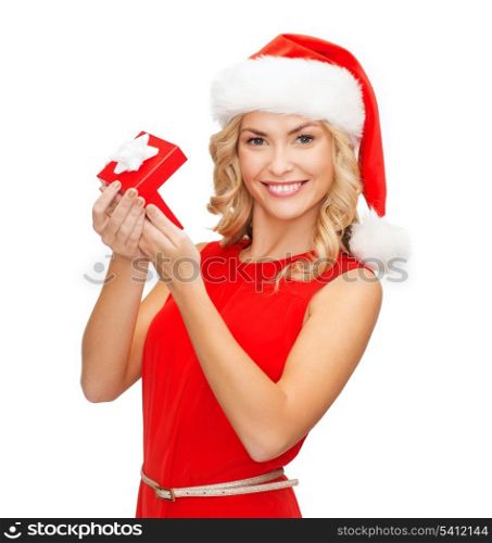 christmas, x-mas, winter, happiness concept - smiling woman in santa helper hat with small jewelry gift box