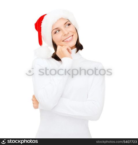 christmas, x-mas, winter, happiness concept - thinking and smiling woman in santa helper hat