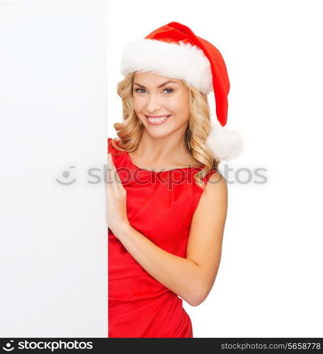 christmas, xmas, holidays and advertisement concept - happy asian woman in santa helper hat with blank white board