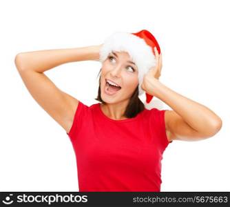 christmas, xmas, winter, happiness concept - surprised woman in santa helper hat