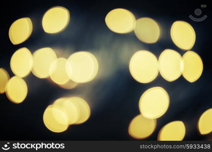 christmas yellow lights blue bokeh defocused background. christmas lights defocused background