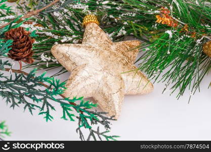 Christmas yellow star and fir tree on gray background.
