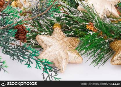 Christmas yellow stars and fir tree on gray background.