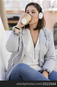 chubby girl enjoying coffee outdoors 2