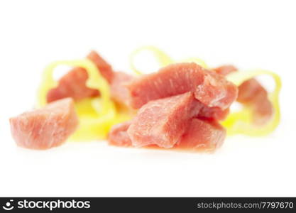 chunks of fresh meat and pepper isolated on white