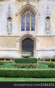 church detail and ornamental garden at Sudeley Castle in Winchcombe, Gloucestershire (United Kingdom)