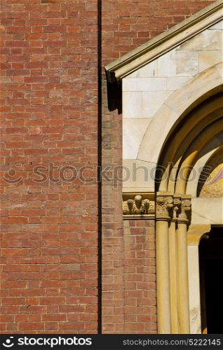 church door in italy lombardy column the milano old closed brick
