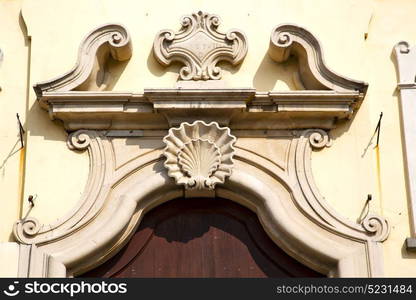 church door in italy lombardy column the milano old closed brick