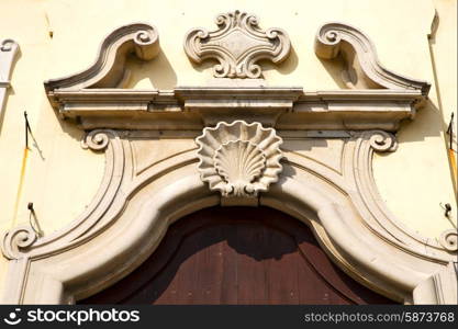 church door in italy lombardy column the milano old closed brick