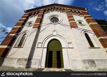 church in the varano borghi closed brick tower sidewalk italy lombardy old