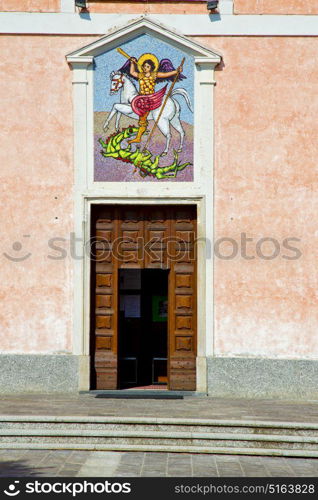 church mornago varese italy the old door entrance and mosaic