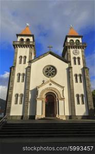 Church of Nossa Senhora da Alegria in Furnas with cloudy blue sky, Azores&#xA;