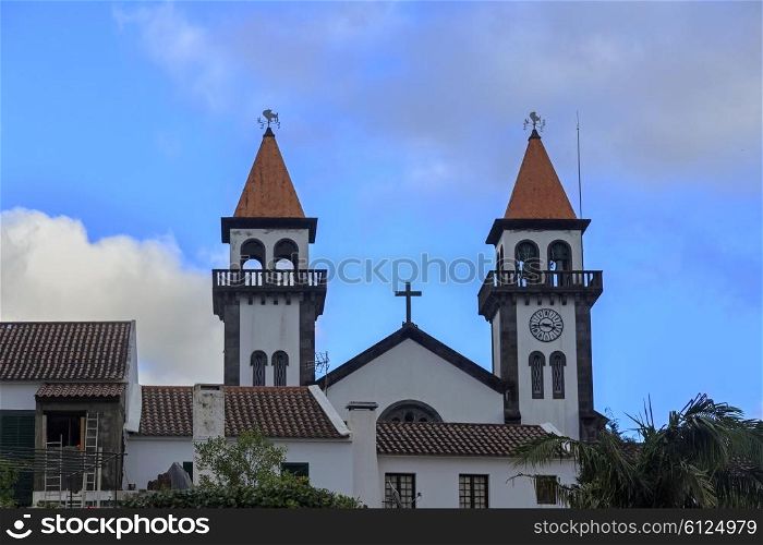 Church of Nossa Senhora da Alegria in Furnas with cloudy blue sky, Azores&#xA;