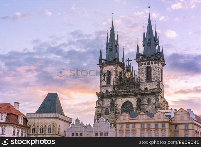 Church of our Lady before Tyn, from Prague Old Town Square, at sunrise, under a beautiful sky