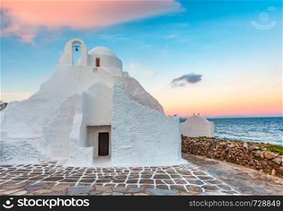 Church of Panagia Paraportiani at sunrise, the most famous architectural structures in Greece, on the island Mykonos, The island of the winds, Greece. Church of Paraportiani on island Mykonos, Greece
