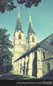 Church of Saint Nicholas (St. Nikolai-Kirche) in Quedlinburg, Germany. Retro style filtered image