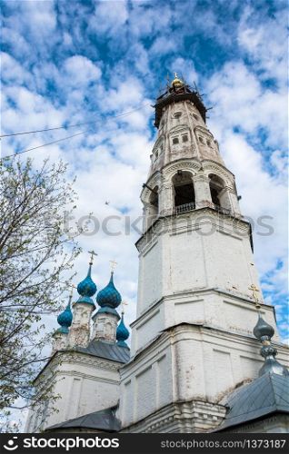 Church of the Holy Archangel Michael and the bodiless hosts in the village of Mikhailovskoye on the background of blue sky and white clouds, Ivanovo oblast, Russia.