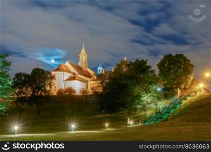 Church San Benson in Old Town on a moonlit night. Warsaw Poland.. Warsaw. The Old Church.